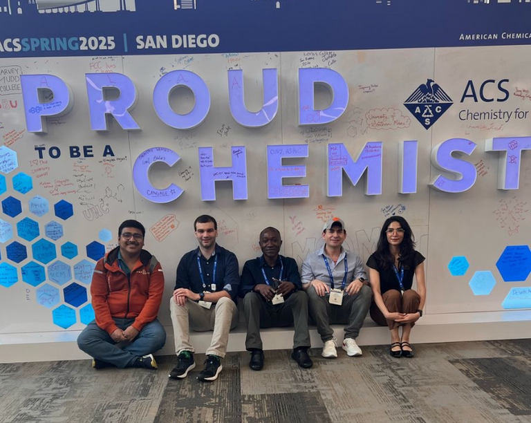 ACS 2025 Sign with former and current group members