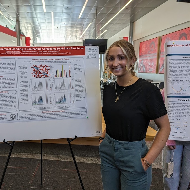 Naomi presents her poster